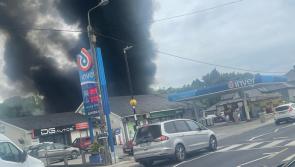 UPDATE: Limerick gardai close road due to garage blaze