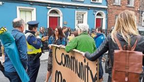 Tensions run high as gardai intervene to move community morning off Limerick street