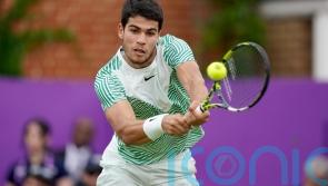 Carlos Alcaraz hopes to thrive on grass this summer after advancing at Queen&rsquo;s