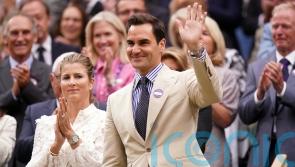 Roger Federer welcomed back to Centre Court for first time since his retirement