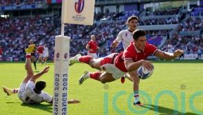 Louis Rees-Zammit claims hat-trick of tries as Wales comfortably top group