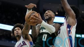 Damian Lillard scores 39 in Milwaukee Bucks&rsquo; 118-117 win over Philadelphia 76ers