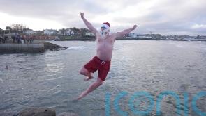 Crowds brave chilly temperatures for Christmas Day swim