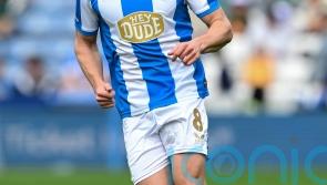 MK Dons stretch unbeaten league run to 11 as Harrogate stay bottom