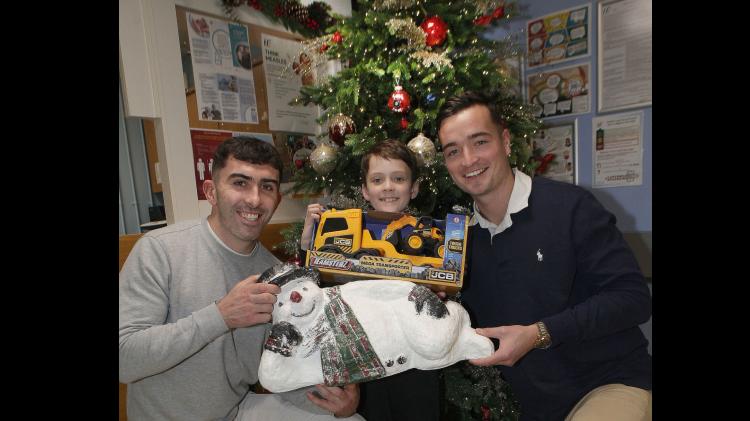 Hurlers play Santa&rsquo;s helpers on Christmas visit to University Hospital Limerick
