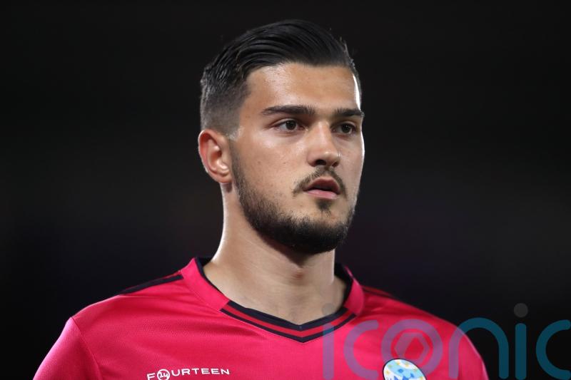 Burnley sign goalkeeper Arijanet Muric from Manchester City on four-year deal