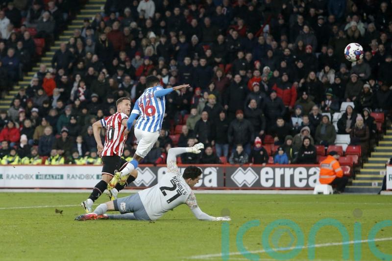 Billy Sharp fires Sheffield United to victory over Huddersfield in drab affair