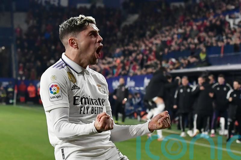 Real Madrid leave it late to beat Osasuna to close gap on Barcelona