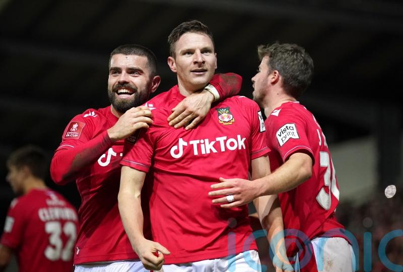 Paul Mullin brace keeps Wrexham on tail of leaders Notts County
