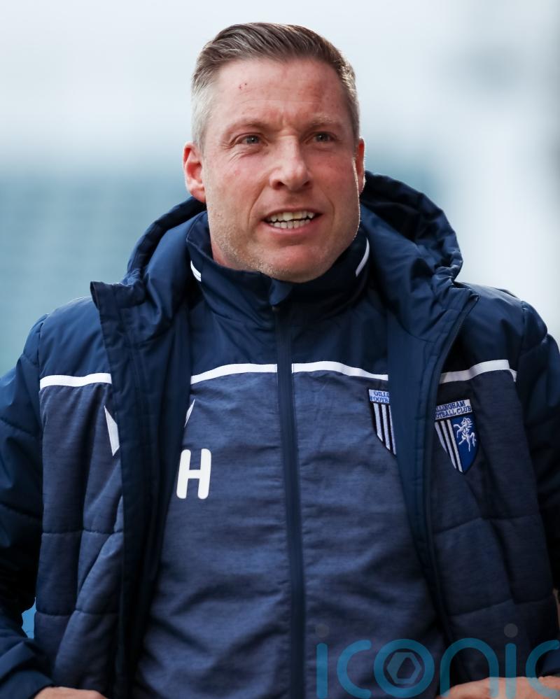 Neil Harris says Gillingham not safe yet after cruising past Tranmere