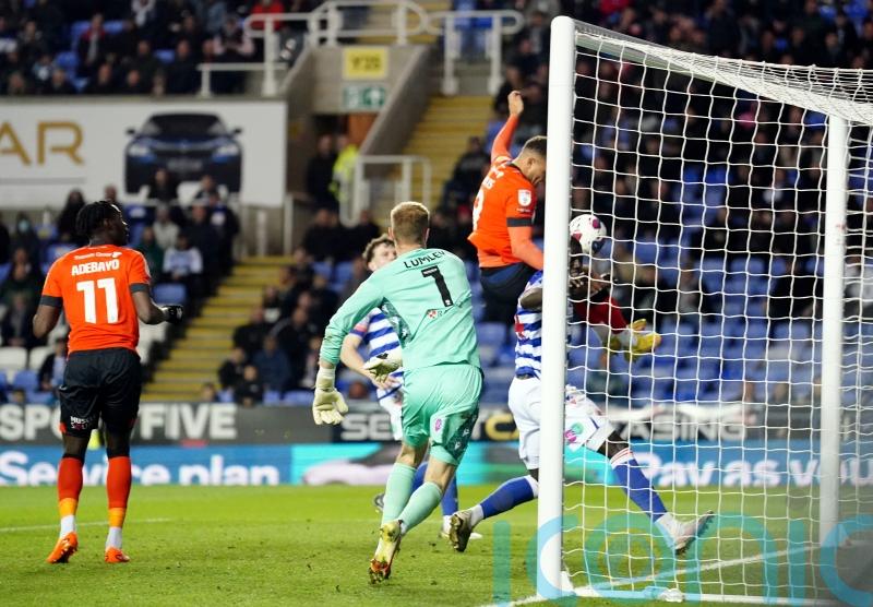 Luton book play-off spot after snatching draw away to 10-man Reading