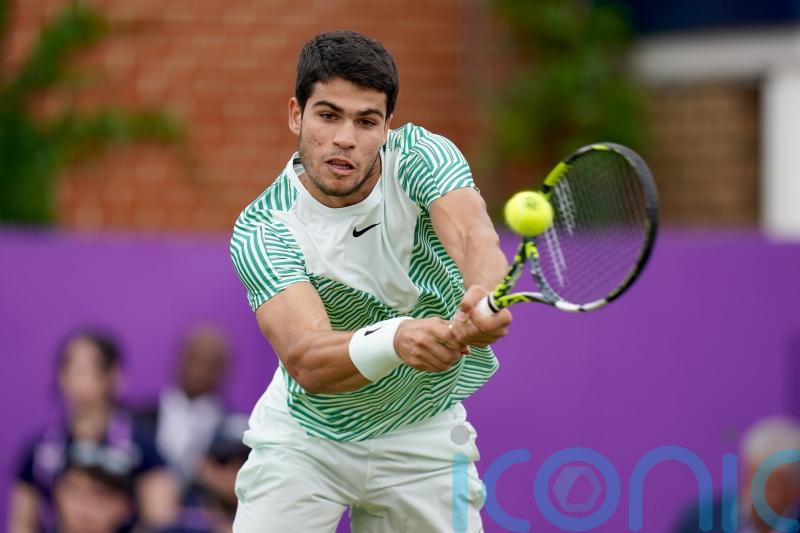 Carlos Alcaraz hopes to thrive on grass this summer after advancing at Queen&rsquo;s