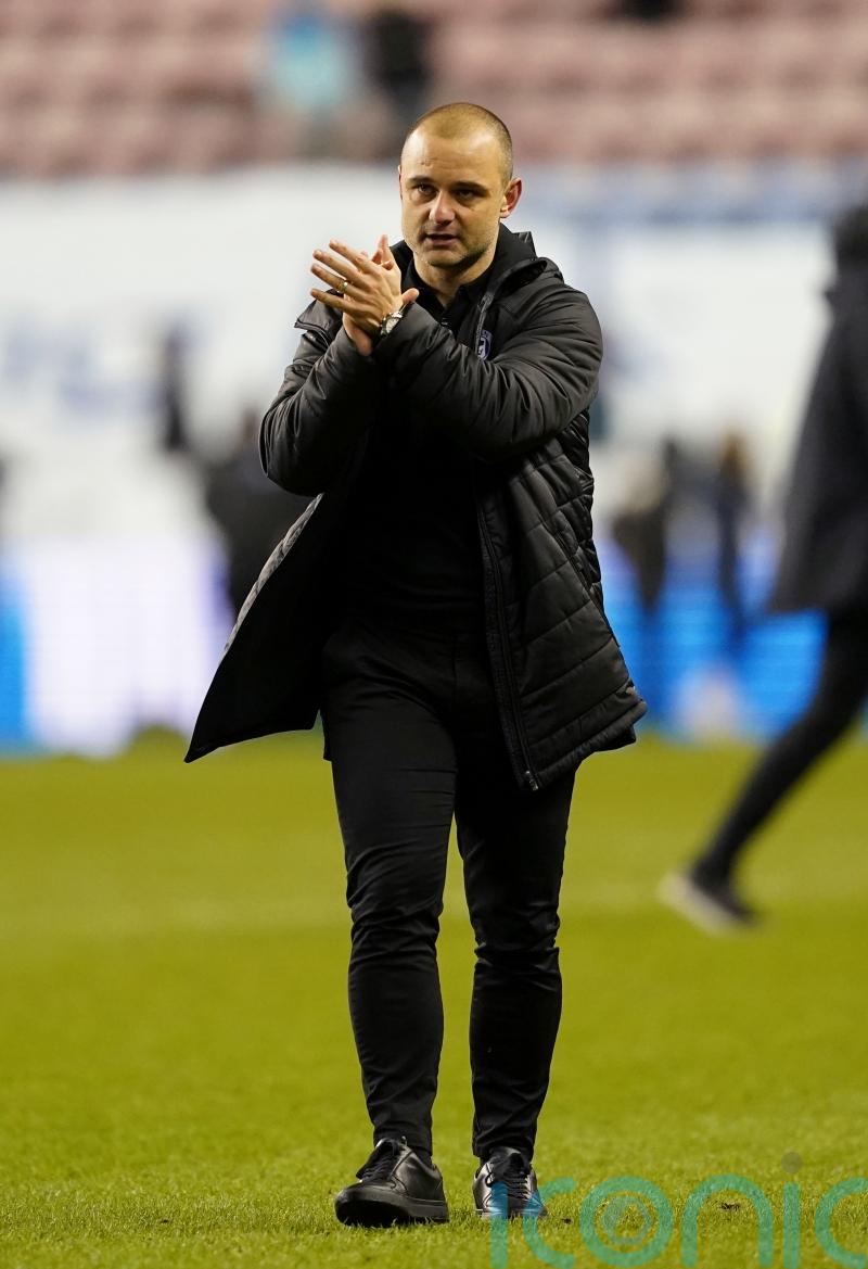 Shaun Maloney salutes Wigan after completing double over Peterborough