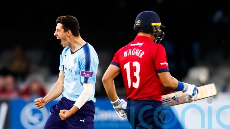 Matt Fisher gives Surrey control of battle against title rivals Nottinghamshire