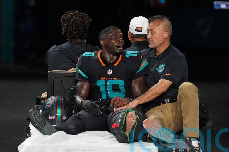 Miami Dolphins top New York Jets 27-21 but lose star Tyreek Hill to leg injury