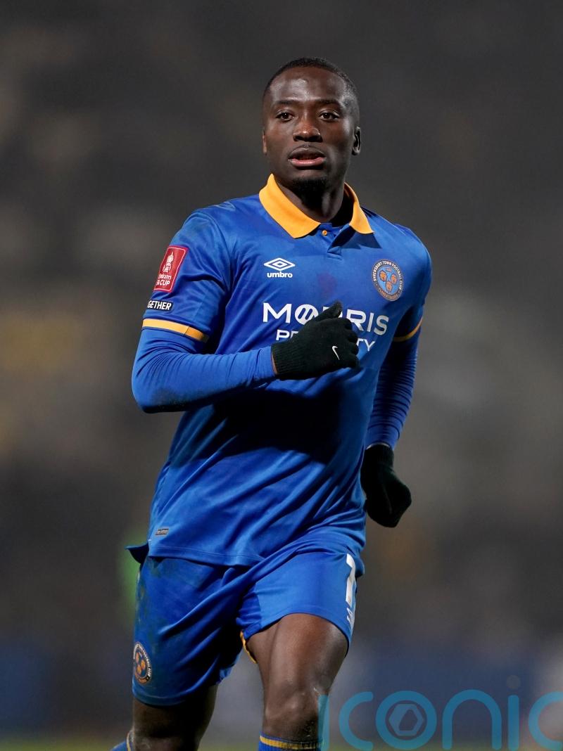 Daniel Udoh header gives Salford narrow win over 10-man Oldham