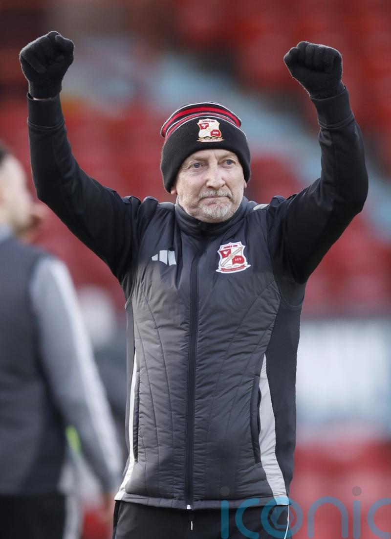 Ian Holloway hails &lsquo;fantastic performance&rsquo; as 10-man Swindon advance in FA Cup