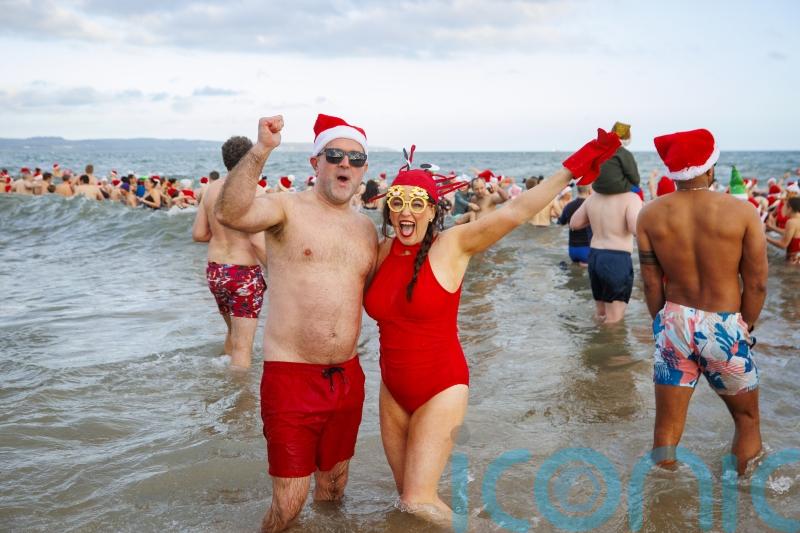 Hundreds brave the cold to make a splash for charity